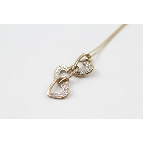 72 - 9ct gold diamond set heart pendant with 9ct gold chain (1.8g)