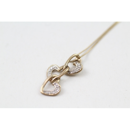 72 - 9ct gold diamond set heart pendant with 9ct gold chain (1.8g)