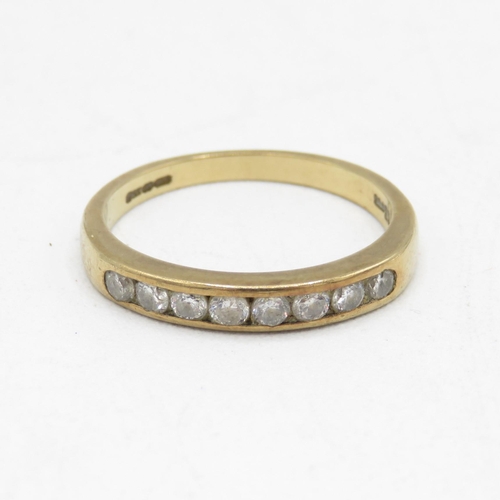 110 - 9ct gold diamond channel set half eternity dress ring (1.9g) Size  M