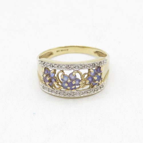 143 - 9ct gold tanzanite & diamond dress ring (3.5g) Size  W