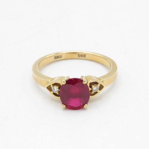 232 - 14ct gold red gemstone solitaire dress ring with diamond set heart shoulders (2.6g) Size  J 1/2