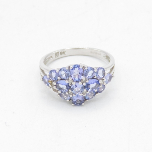 237 - 9ct gold tanzanite & diamond cluster ring (2.9g) Size  N 1/2