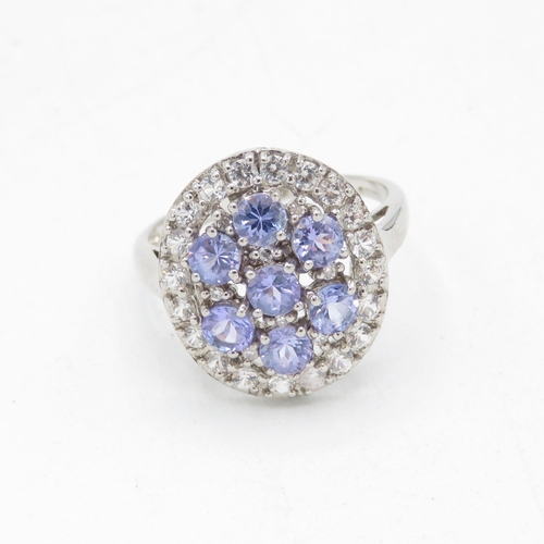 61 - 9ct white gold tanzanite and white sapphire cluster cocktail ring (3.6g) Size  O