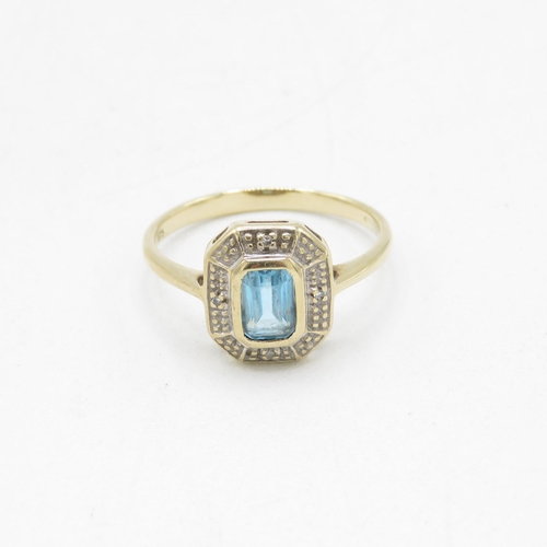 89 - 9ct gold vintage blue topaz and diamond halo dress ring (2.5g) Size  P