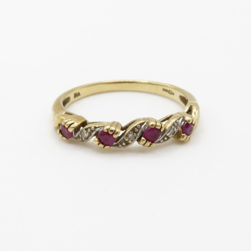 129 - 9ct gold ruby and diamond wave design dress ring (2g) Size  P 1/2