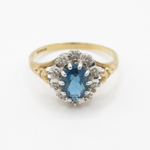 149 - 9ct gold blue topaz & diamond dress ring (1.9g) Size  O