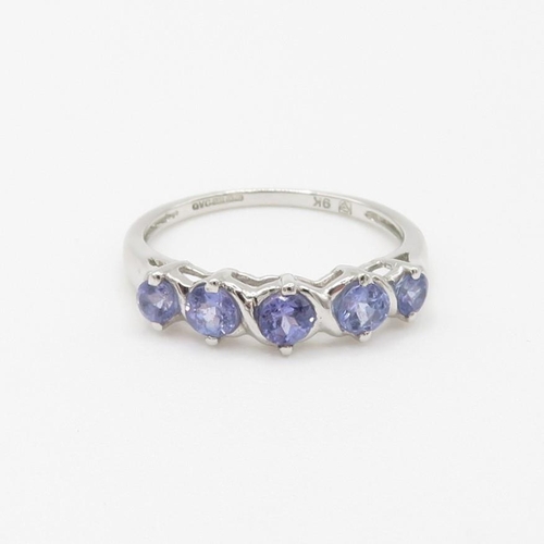 37 - 9ct gold tanzanite half eternity ring (1.6g) Size  J 1/2