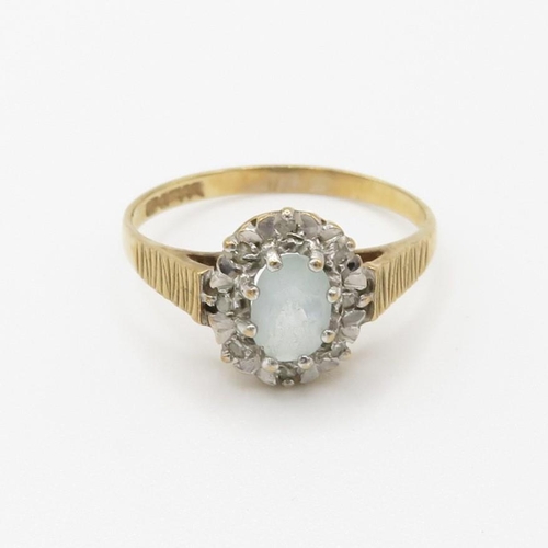 46 - 9ct gold aquamarine and diamond halo dress ring (1.7g) Size  N