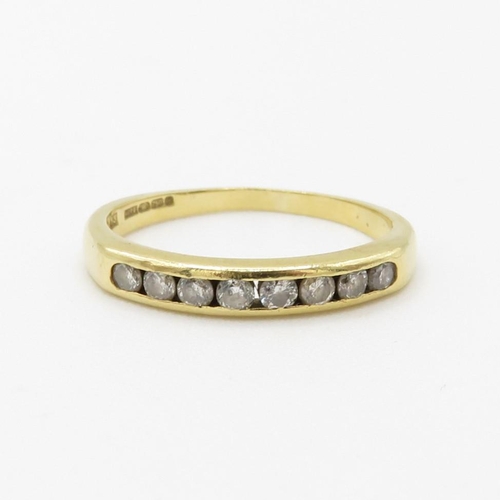 79 - 18ct gold channel set diamond half eternity dress ring (2.5g) Size  P