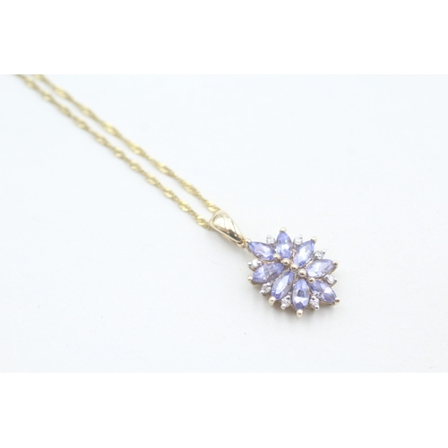 105 - 9ct gold diamond accented tanzanite set cluster pendant necklace (2.4g)