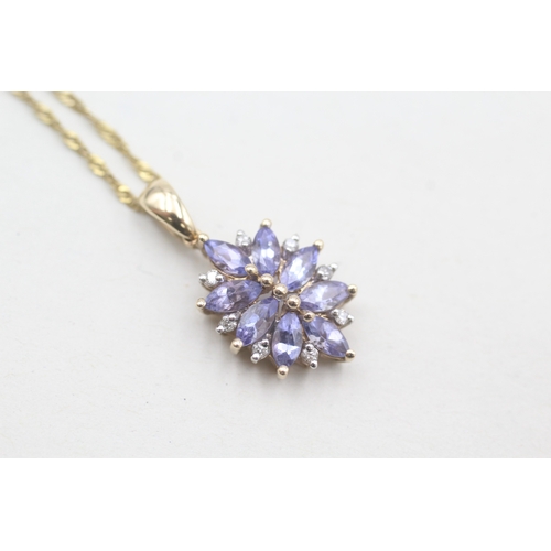 105 - 9ct gold diamond accented tanzanite set cluster pendant necklace (2.4g)