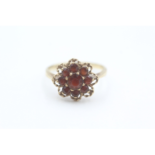 108 - 9ct gold vintage garnet set floral cluster ring (2.2g) Size  N