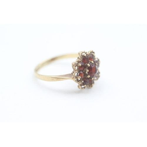 108 - 9ct gold vintage garnet set floral cluster ring (2.2g) Size  N