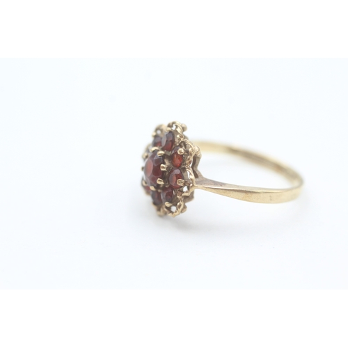 108 - 9ct gold vintage garnet set floral cluster ring (2.2g) Size  N