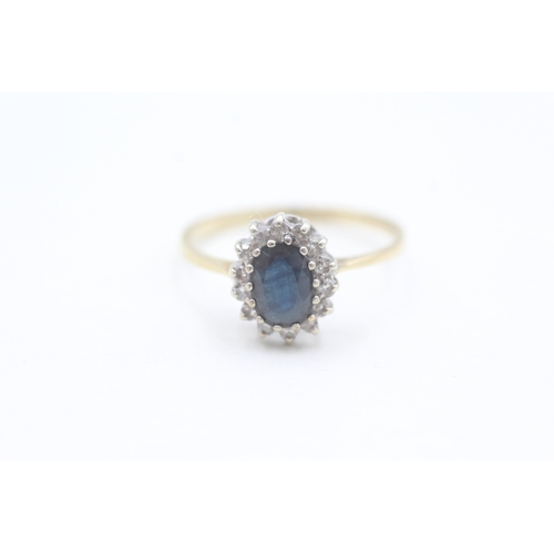 109 - 9ct gold diamond and sapphire oval cluster ring (1.7g) Size  Q