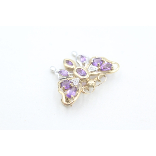 111 - 9ct gold amethyst and diamond set openwork butterfly brooch (2.6g)