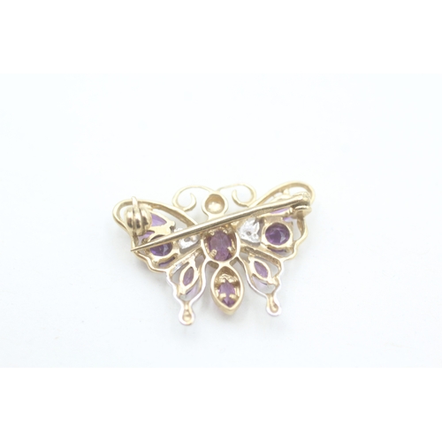 111 - 9ct gold amethyst and diamond set openwork butterfly brooch (2.6g)