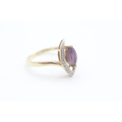 114 - 9ct gold diamond and amethyst set marquise shaped dress ring (2.3g) Size  N