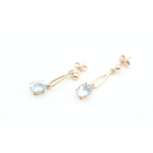 122 - 9ct rose gold oval cut aquamarine set drop earrings (1.8g)