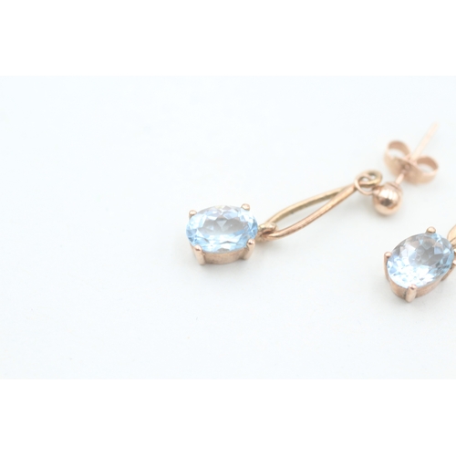 122 - 9ct rose gold oval cut aquamarine set drop earrings (1.8g)