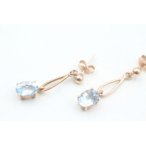 122 - 9ct rose gold oval cut aquamarine set drop earrings (1.8g)