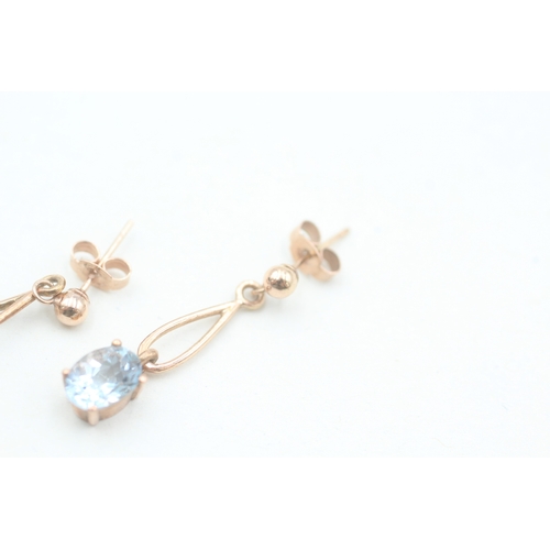 122 - 9ct rose gold oval cut aquamarine set drop earrings (1.8g)