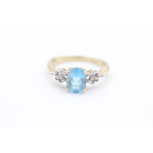 126 - 9ct gold diamond and blue topaz set dress ring (2.5g) Size  N