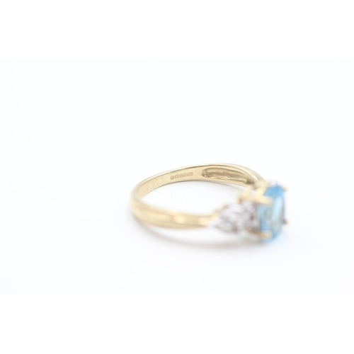 126 - 9ct gold diamond and blue topaz set dress ring (2.5g) Size  N