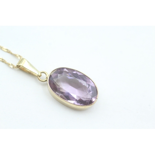 128 - 9ct gold vintage oval cut amethyst set pendant necklace (3.1g)