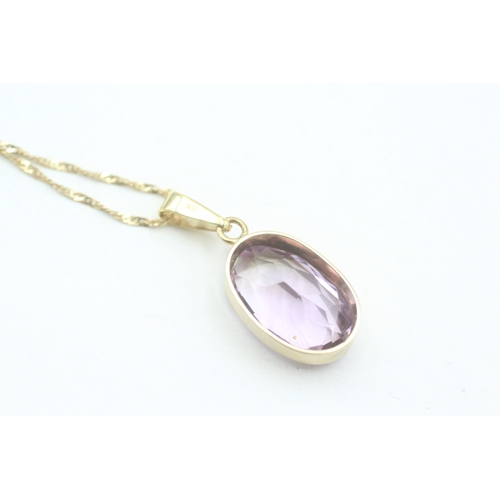 128 - 9ct gold vintage oval cut amethyst set pendant necklace (3.1g)