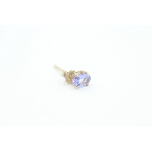 138 - 9ct gold oval cut tanzanite set stud earrings (0.7g)