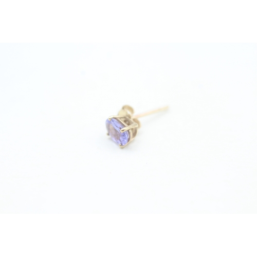 138 - 9ct gold oval cut tanzanite set stud earrings (0.7g)