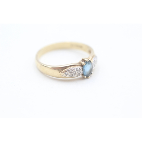 149 - 9ct gold diamond and blue topaz dress ring (2.6g) Size  Q