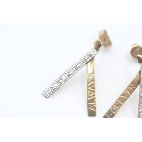 150 - 9ct white and yellow gold diamond accented line drop earrings (2.4g)