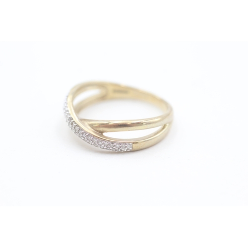 155 - 9ct gold pave set diamond crossover ring (3.4g) Size  Q