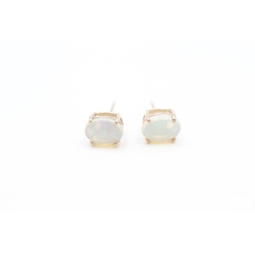 159 - 18ct gold translucent opal set stud earrings (1.2g)