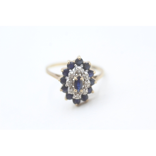 164 - 9ct gold diamond and sapphire set marquise shaped cluster ring (2.1g) Size  N