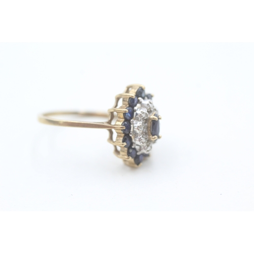 164 - 9ct gold diamond and sapphire set marquise shaped cluster ring (2.1g) Size  N