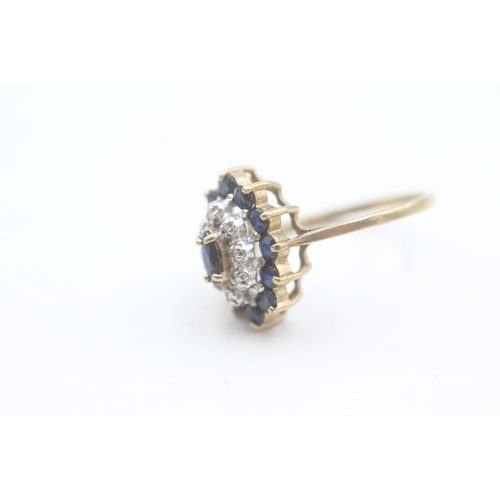 164 - 9ct gold diamond and sapphire set marquise shaped cluster ring (2.1g) Size  N