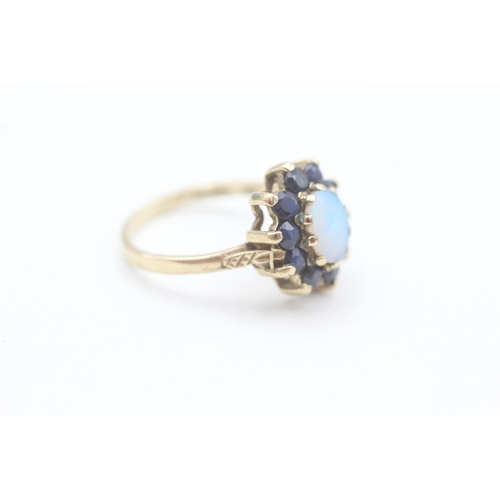 165 - 9ct gold opal and sapphire set cluster ring (2.9g) Size  M