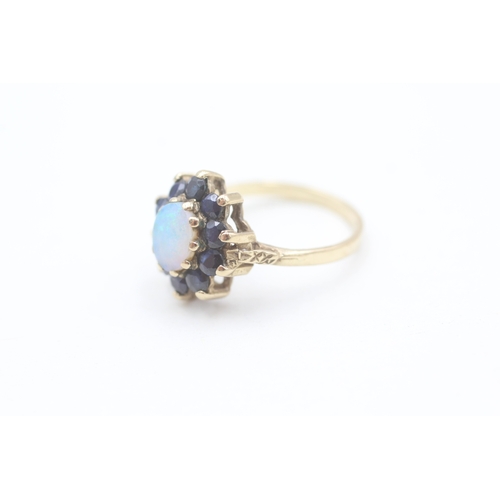 165 - 9ct gold opal and sapphire set cluster ring (2.9g) Size  M