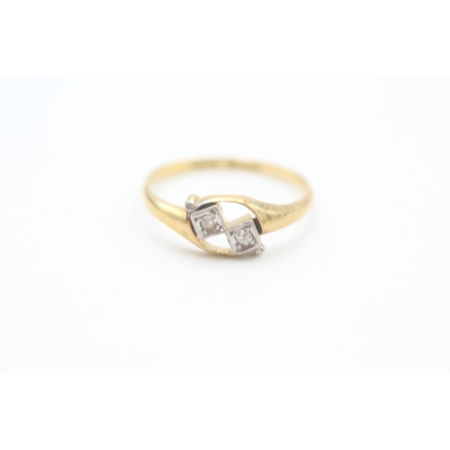 166 - 18ct gold Art Deco diamond set bypass ring (2g) Size  M