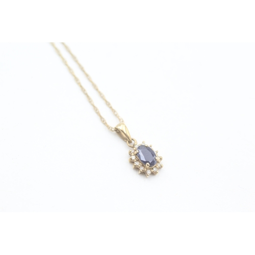 173 - 9ct gold diamond and sapphire set cluster pendant necklace (1.3g)