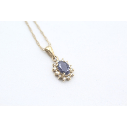 173 - 9ct gold diamond and sapphire set cluster pendant necklace (1.3g)