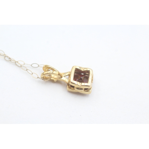 176 - 9ct gold chequer cut garnet set solitaire pendant necklace (1.9g)