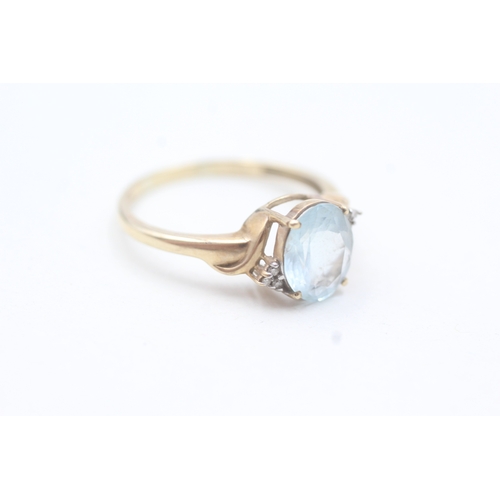 180 - 9ct gold aquamarine single stone ring with diamond accents (2.5g) Size  T