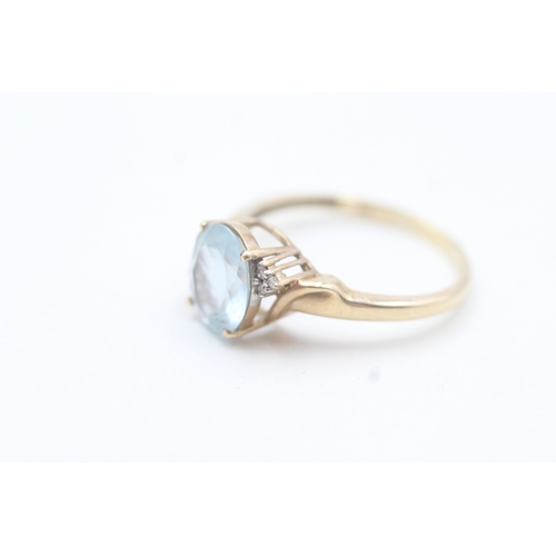 180 - 9ct gold aquamarine single stone ring with diamond accents (2.5g) Size  T