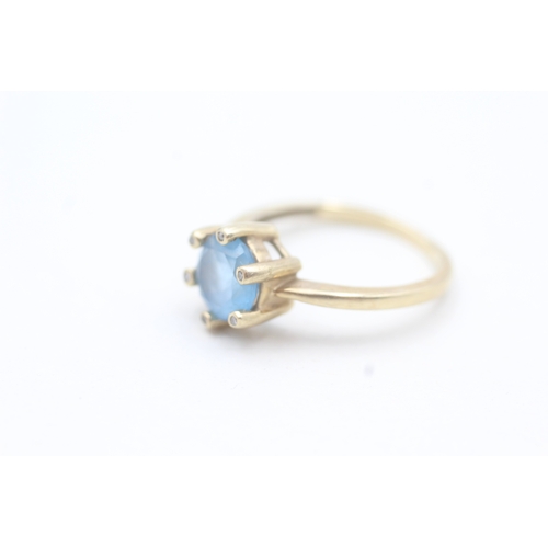 181 - 9ct gold topaz single stone ring with diamond highlight (3.2g) Size  P