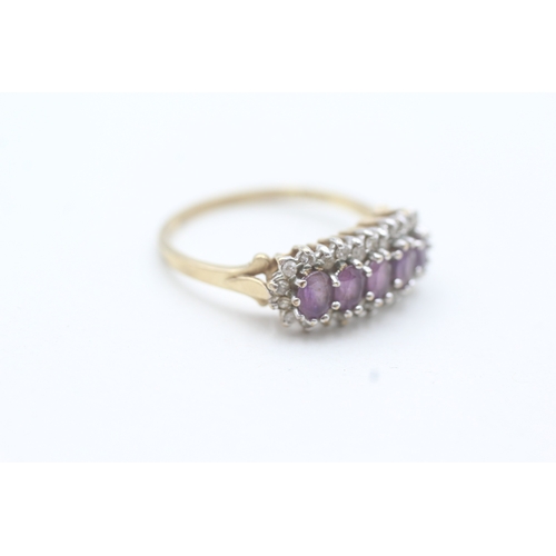 188 - 9ct gold amethyst five stone ring with diamond frame (2.4g) Size  P