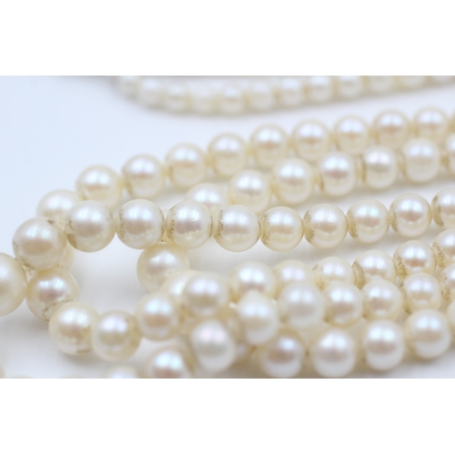 190 - 9ct gold cultured pearl three strand necklace (42.6g)